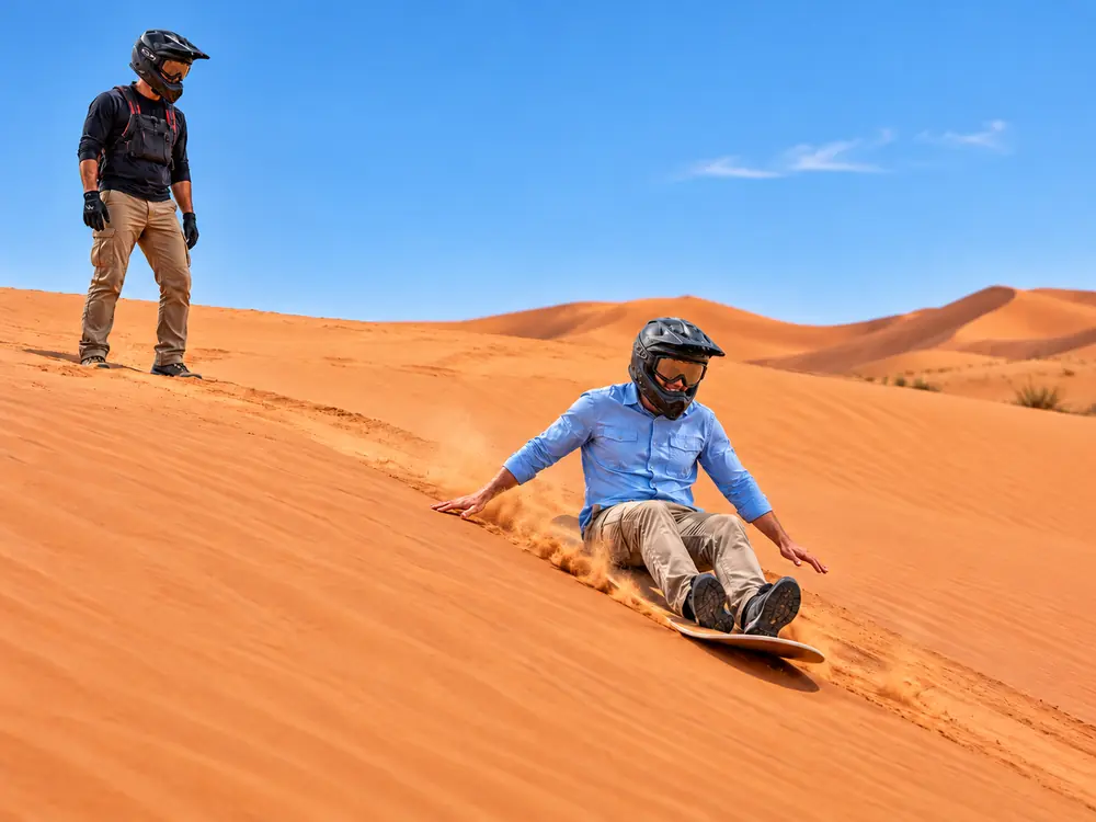 Sandboarding included with Can-Am dune buggy experience Dubai